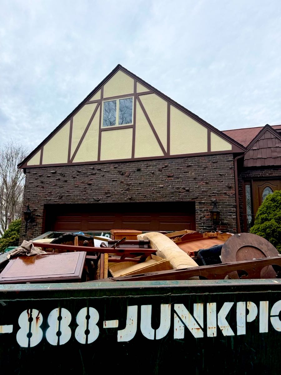 20 yard dumpster loaded during a whole-house cleanout in Norwood, MA